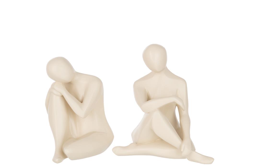 2 FIGUREN SITZEND POLYRESIN BEIGE